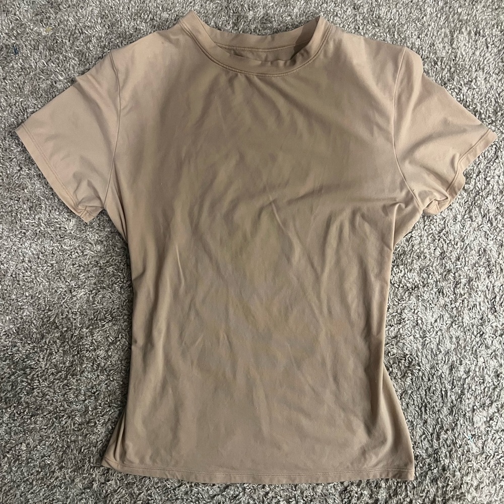 skims tan top